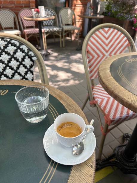 istock cup of coffee on the table outdoor 1631942342