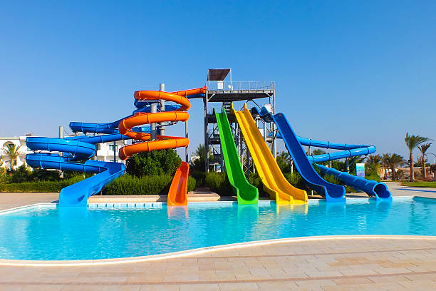 parco acquatico - vibrant color yellow recreational equipment red foto e immagini stock