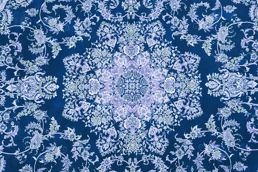 Soft blue carpet with beautiful pattern as background, top view
