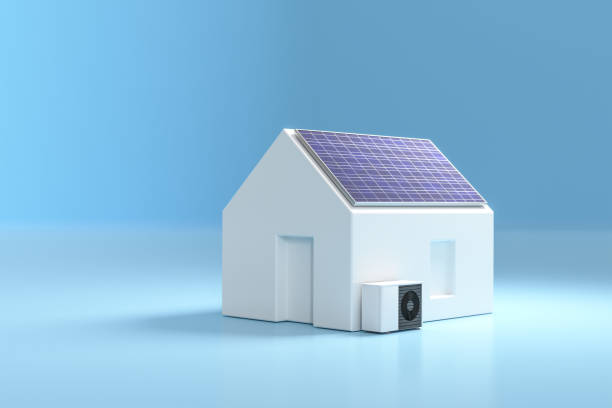 istock Model home with solar panel and heatpump. Concept for sustainable power generation and heating with electric heatpumps. 1631960191