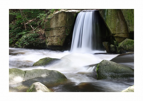 Small waterfall with blurred water in long exposure