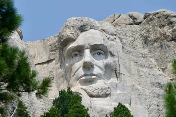 Photo of Abraham Lincoln with pines at Mt. Rushmore