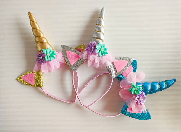 istock unicorn bandana with silver, gold and blue horns 1631988310