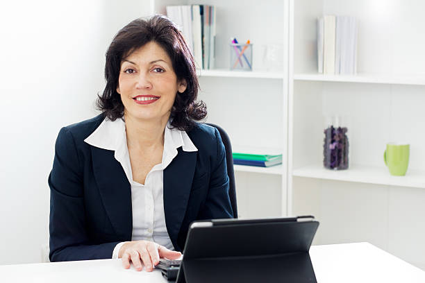 istock Brunette mature businesswoman 163202082