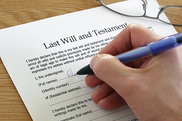 Signing Last Will and Testament Signing Last Will and Testament document last stock pictures, royalty-free photos & images