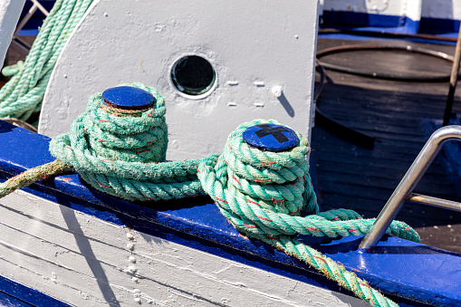 iron shipboard bitts with rope