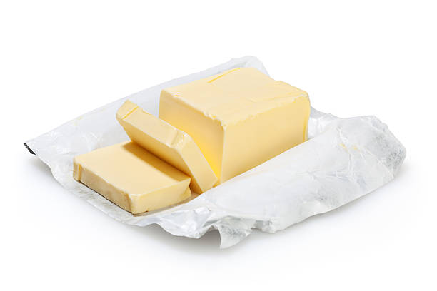 Butter isolated on white Butter isolated on white background with clipping path butter stock pictures, royalty-free photos & images