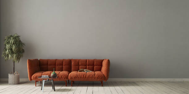 istock Living room interior with orange sofa on gray concrete wall background. Interior mockup, 3d render 1632050862