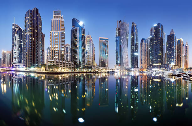 istock Dubai Marina panorma at night, UAE 1632059488
