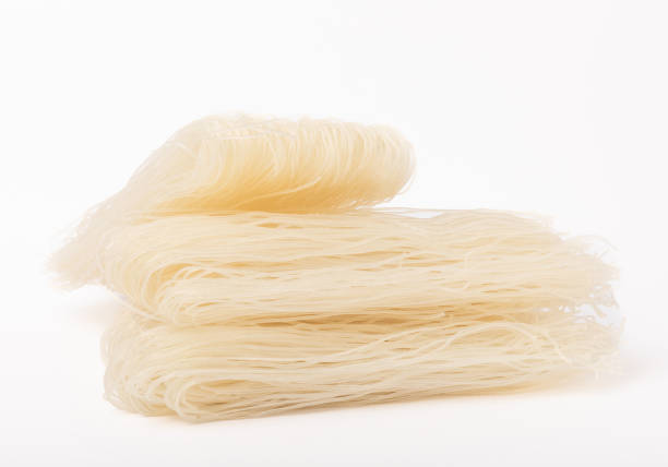 istock Dried noodles with rice flour isolated on white background. 1632060031