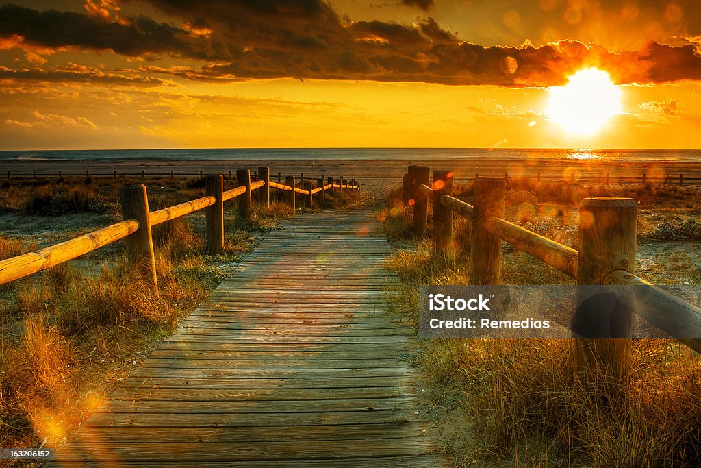 A beautiful image of sunset on the beach Sunset beach. Costline Cabo de Gata, Almeria, Spain-This photo made by hdr technic Beach Stock Photo