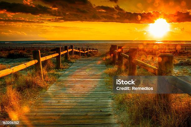 A Beautiful Image Of Sunset On The Beach Stock Photo - Download Image Now - Beach, Horizontal, Landscape - Scenery