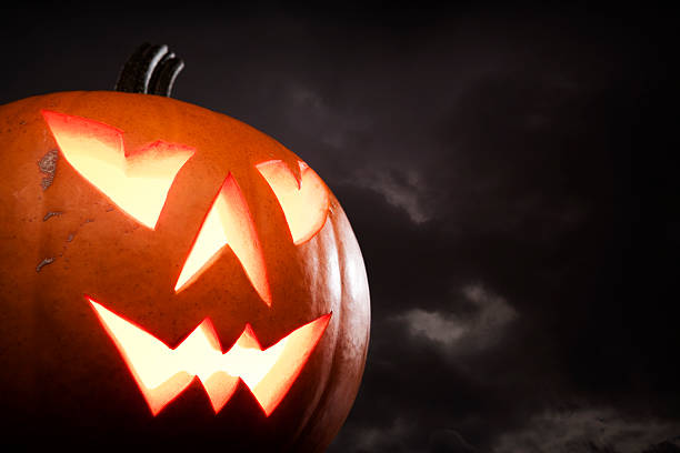 Jack O' Lantern Scary Jack O' Lantern. Halloween theme. halloween pumpkin scary stock pictures, royalty-free photos & images