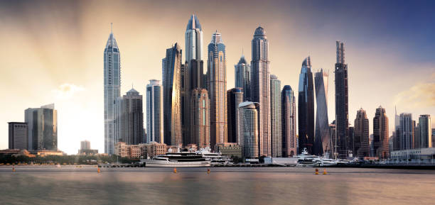 istock Dubai panorama skyline at dramatic sunset in Marina, United Arab Emirates 1632067766