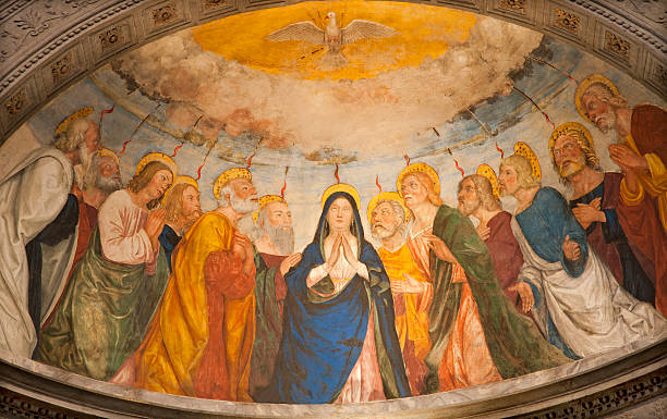 A painting of Pentecost in Saint Anastasia church in Verona Verona - Apse of Chapel Miniscalchi in Saint Anastasia's church from year 1506 designed by Angelo di Giovanni with main scene of the Pentecost on January 27, 2013 in Verona, Italy. apostle worshipper photos stock pictures, royalty-free photos & images