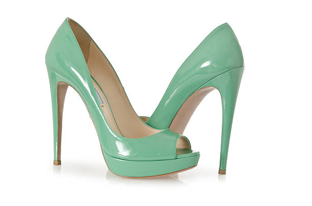 istock Woman green shoes isolated on white 163208462