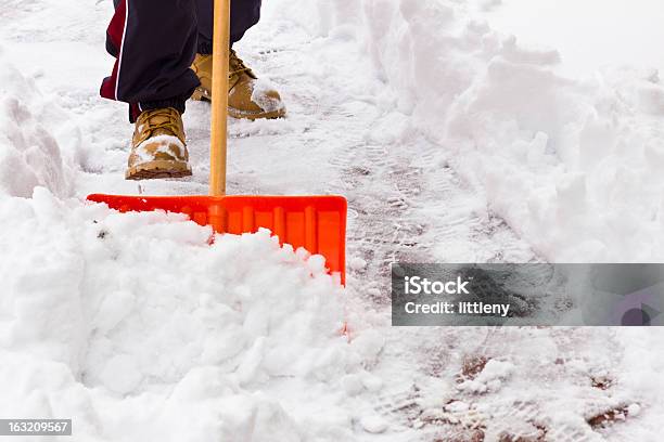 Snow Shoveling Stock Photo - Download Image Now - Snow, Removing, Shovel