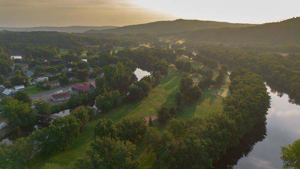 istock Sunny early morning on a golf course 1632113519