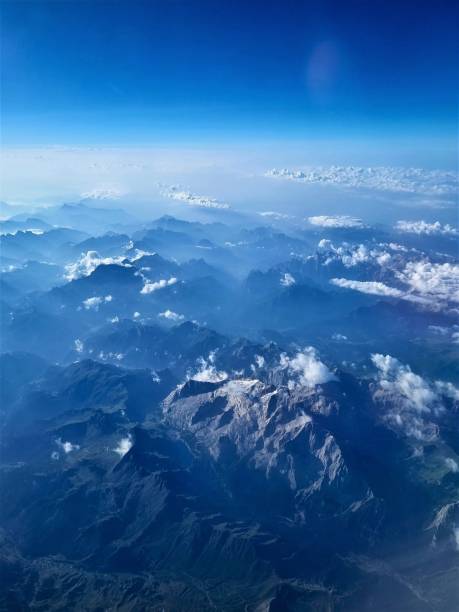 istock view of mountain peaks from airplane 1632165763