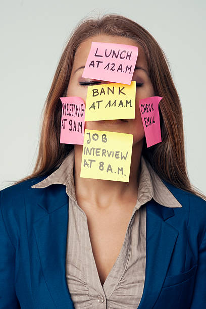 istock Woman with reminder notes stuck all over her face 163217818
