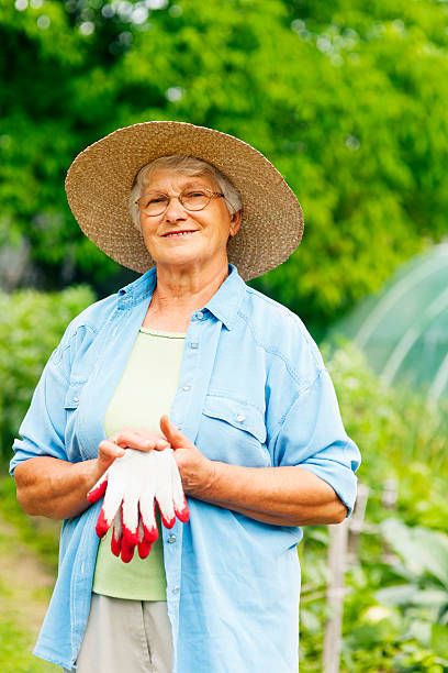 senior agricoltore - manual worker glasses gardening domestic life foto e immagini stock