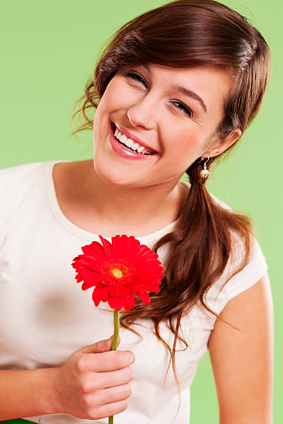 istock Beautiful woman with gerbera 163218596