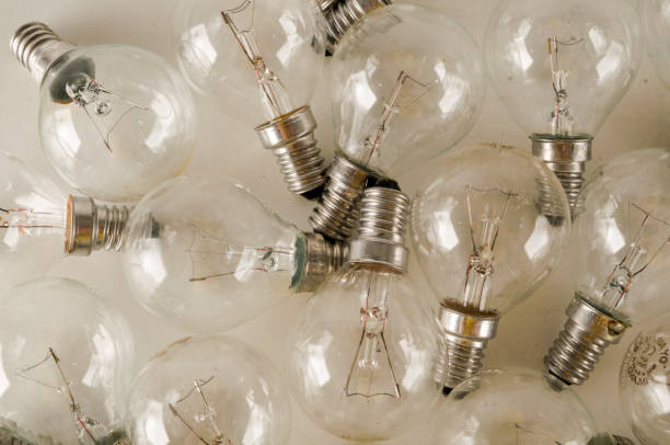 istock Background with a lot of light bulbs 1632189852