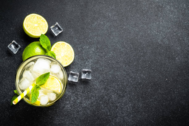 istock Mojito with rum and lime on black background. 1632196793