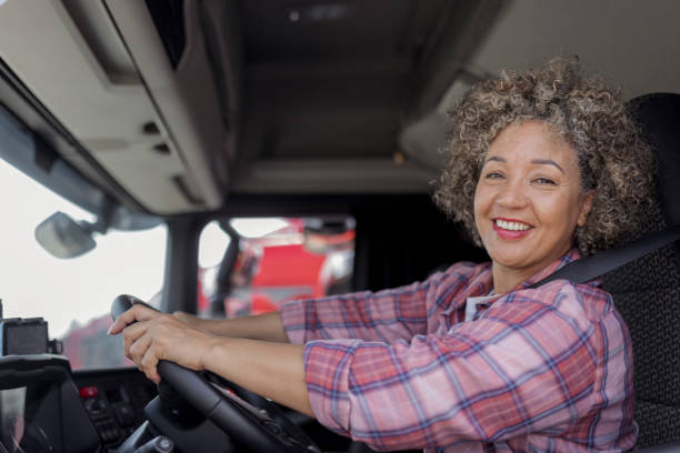 Female Truck Driver Looking at Camera