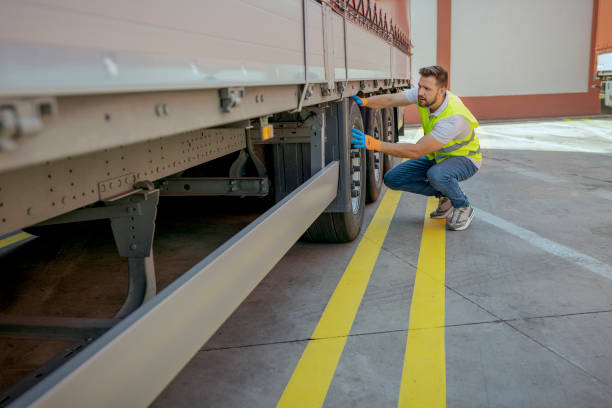 istock Truck Driver Checking the Truck's Safety 1632197316