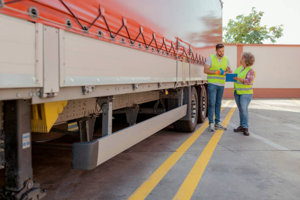 istock Logistics Manager Controlling Truck Driver Schedule 1632197420