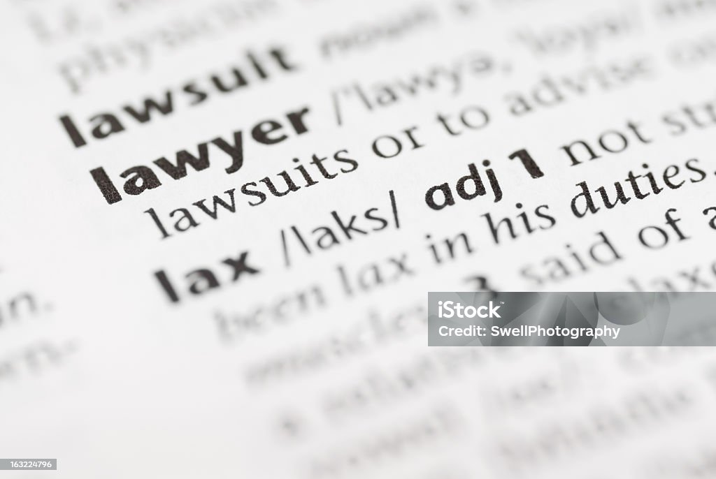 Macro Dictionary Word: Lawyer. Macro image of dictionary word: Lawer, and pencil. Black Color Stock Photo