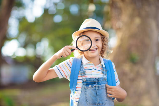 istock Kids explore nature. Children hike in sunny park. 1632283174