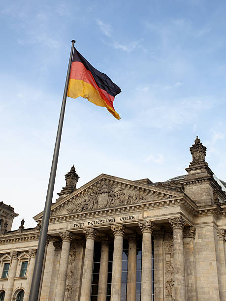 istock Reichstag in Berlin wih German flag 163230404