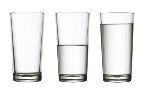 tall empty, half and full glass of water isolated on white with clipping path included