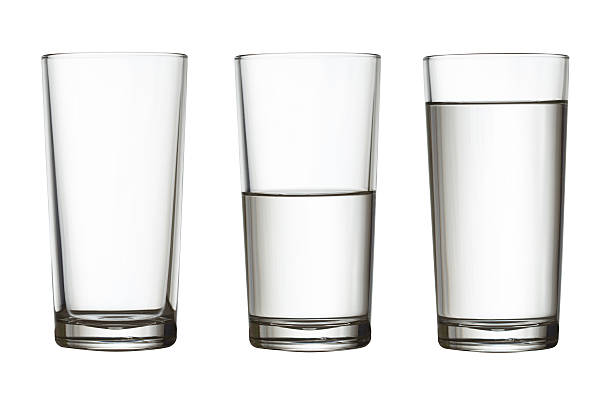 tall empty, half and full glass of water isolated tall empty, half and full glass of water isolated on white with clipping path included half full stock pictures, royalty-free photos & images
