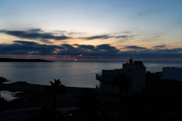 istock Sunrise over the sea at S'Illot 1632343059