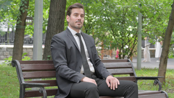 Free Stock Photo of Businessman in Suit and Tie Sitting on Bench ...