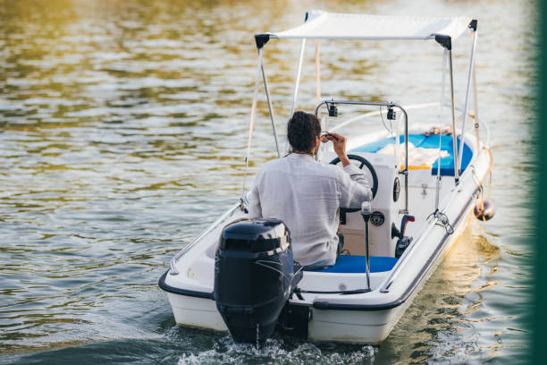 istock An Unrecognizable Handsome Man Driving His Riverboat 1632364638