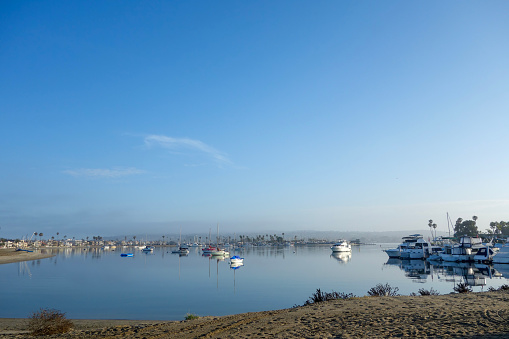 Boats and yachts anchored in Santa Barbara Cove at Mission Bay, San Diego, California; copy space