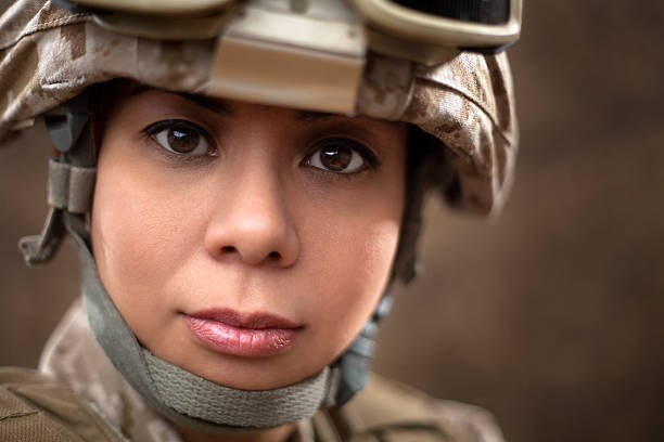 istock US Marine Female Soldier in Combat Gear 163243865