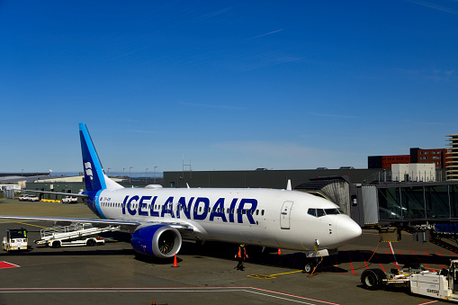 Keflavík, Reykjanes region, Iceland: IcelandAir Boeing 737 MAX 8 (MSN 60010 , registration TF-ICM) at a passenger boarding bridge, starboard view - Keflavik Airport (IATA: KEF, ICAO: BIKF) aka Reykjavík–Keflavík Airport. Icelandair is the national airline of Iceland, headquartered in Keflavik and based at Keflavik Airport. It is a subsidiary of the publicly traded Icelandair Group. Icelandair's origins date back to Flugfélag Akureyrar airline, which was founded in 1937.