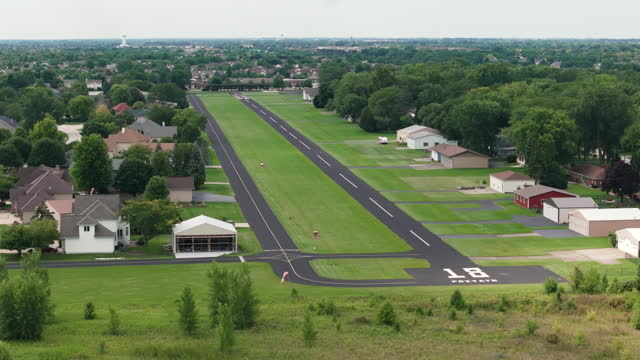 Aerial View Of Buildings And Airfield Of aero club Airport in suburb