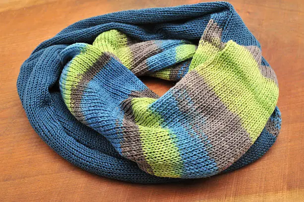colored loop scarf on board