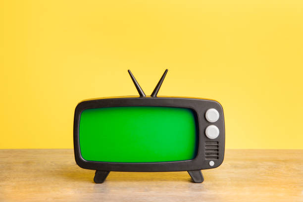 istock Toy TV with Green Screen on Yellow 1632492010