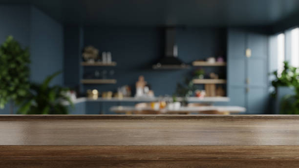 Wooden table top on blur kitchen room background,Modern kitchen room interior Wooden table top on blur kitchen room background,Modern kitchen room interior.3d rendering open space bar stock pictures, royalty-free photos & images