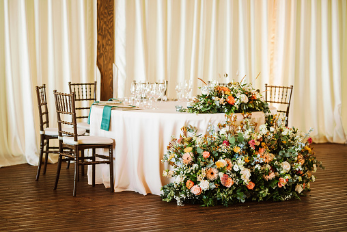 A table in the banquet hall of the restaurant. organization of events and decor of the restaurant.