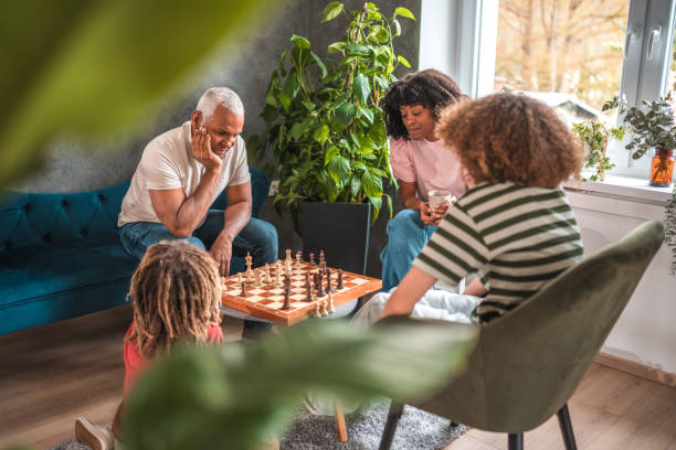 istock Family Chess Game Night 1632539500