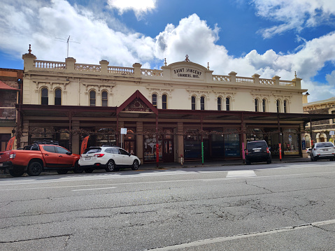 Facade of St Vincent Chambers, a heritage building in Port Adelaide. \nSt Vincent Chambers is a rare example of a two-storey\nterrace of shops and residences. SouthAustralia