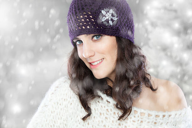 Close-up beautiful face of young woman with white sweater